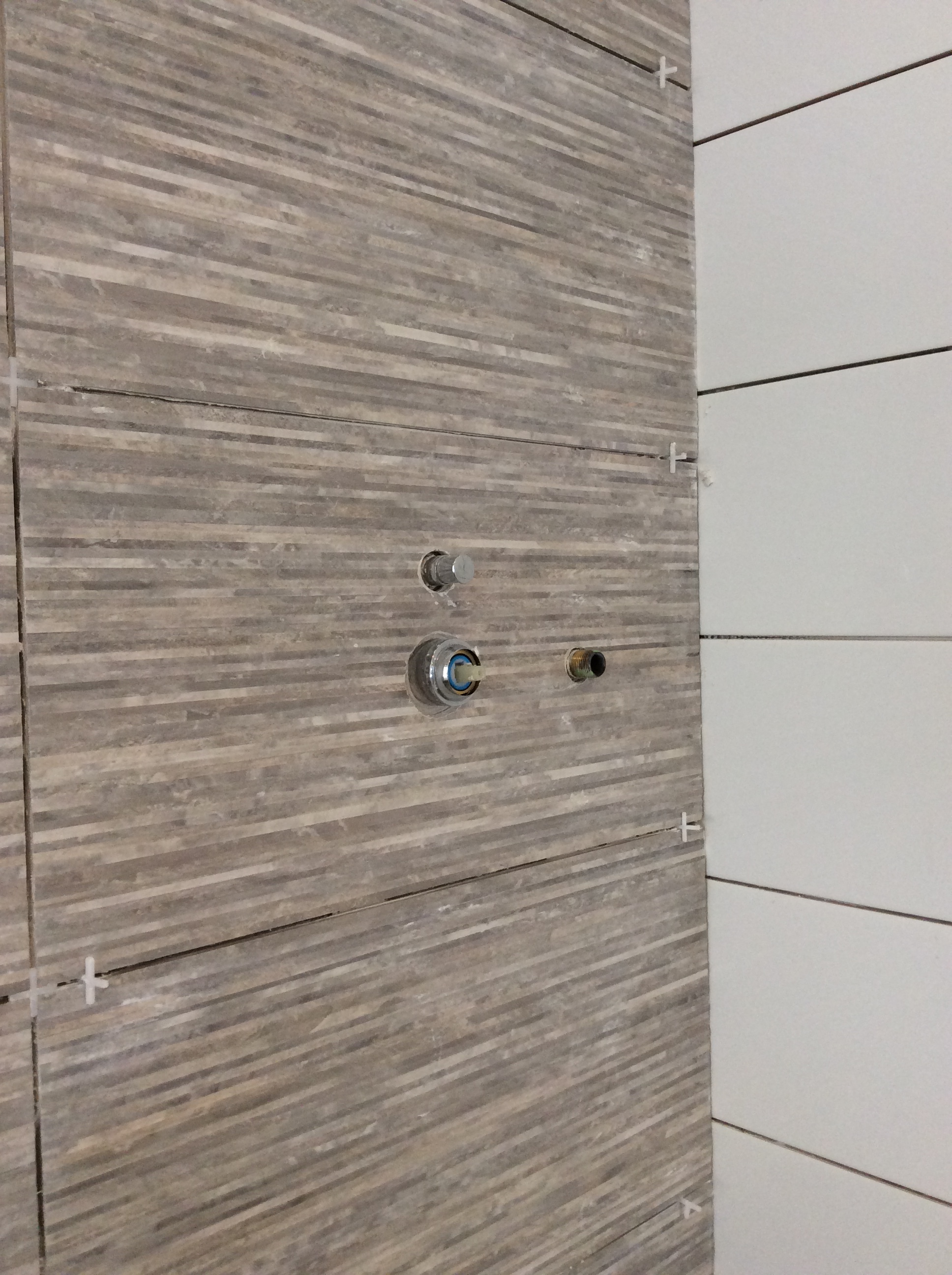 Bathroom tiling in progress